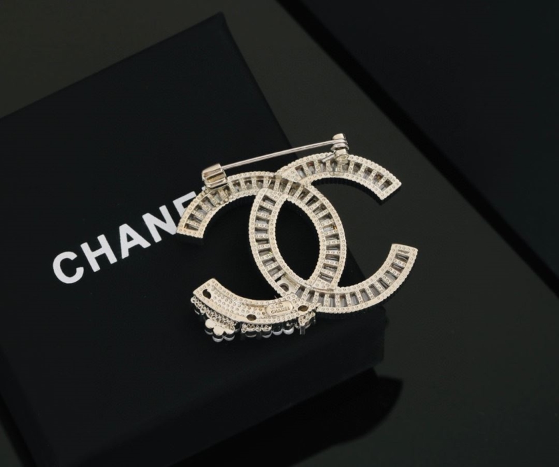 Ch**el brooches